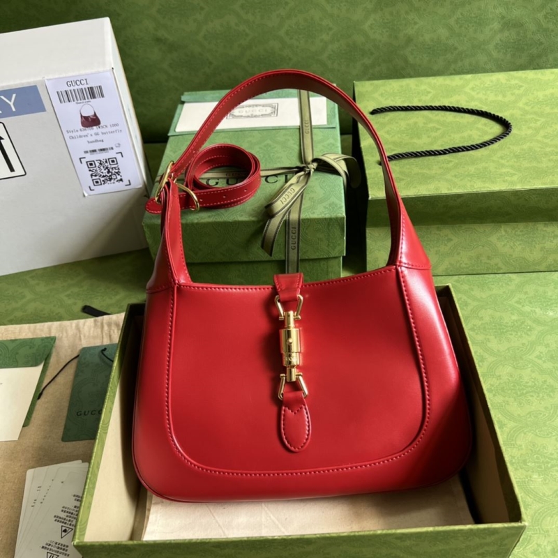 G*u*i top handle bags